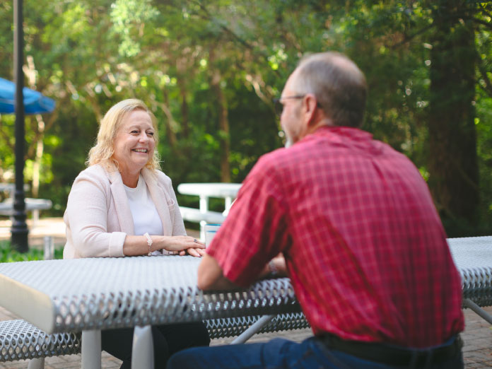 a person asking another how does medicare work